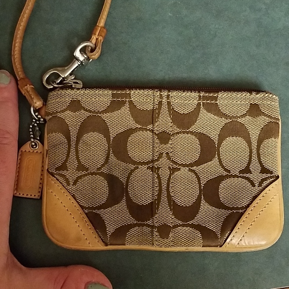 Coach wristlet, small. Brown and tan, used